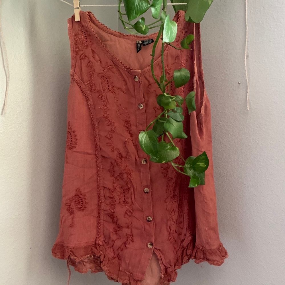 orangey-pink tank